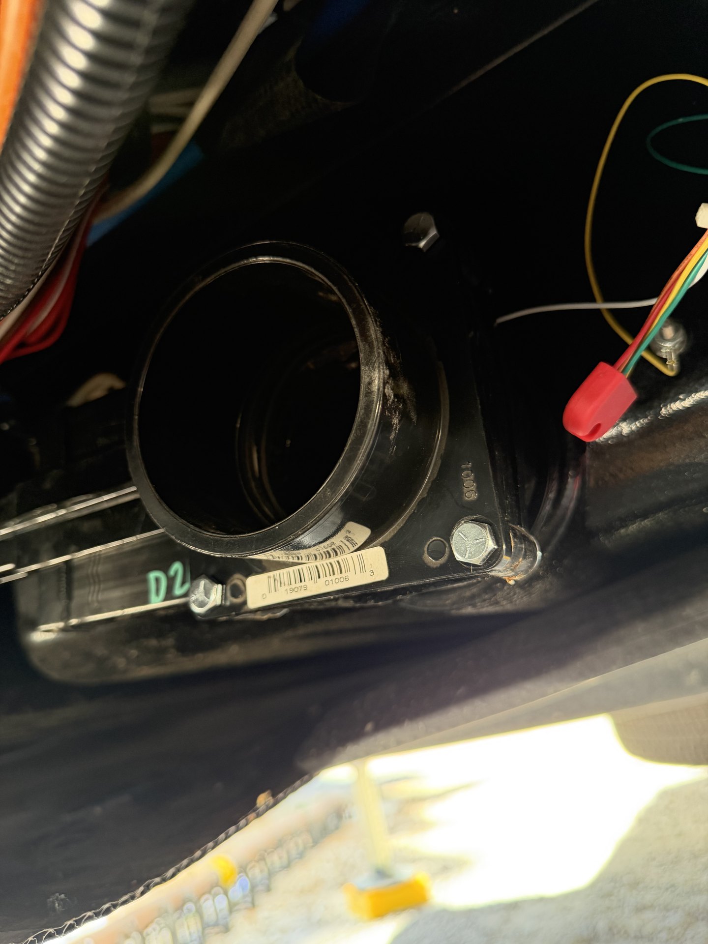 RV furnace duct collar and mounting flange with wiring connections exposed during a ducting repair